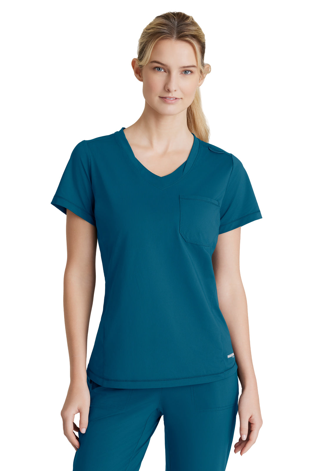 Women's 1 Pocket Tulip Hem Flow Top